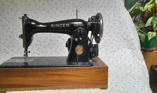 Antiquités machine à coudre Singer ancienne.