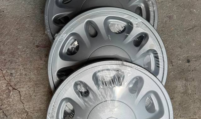 Auto-Moto 4 jantes plastiques neuves 14", sous emballage