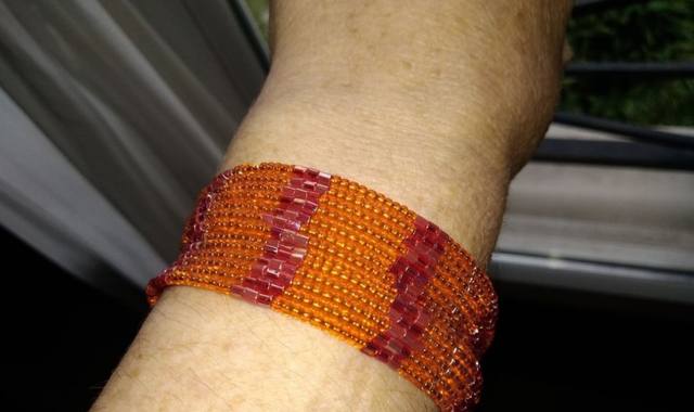 Bijoux, accessoires bracelet en perles orange