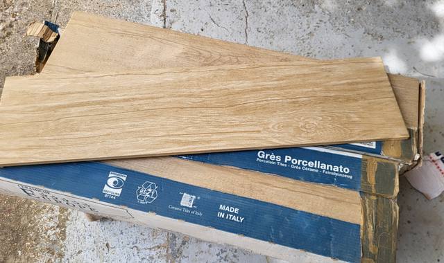 Bricolage reste carreaux Sol imitation bois en grès