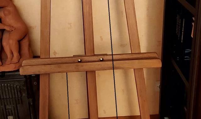 Meubles chevalet avec trois tableaux