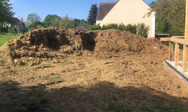 Terre et gravats terre de remblais environ 9 bennes