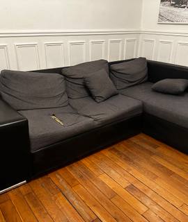 Meubles canapé convertible fatigué